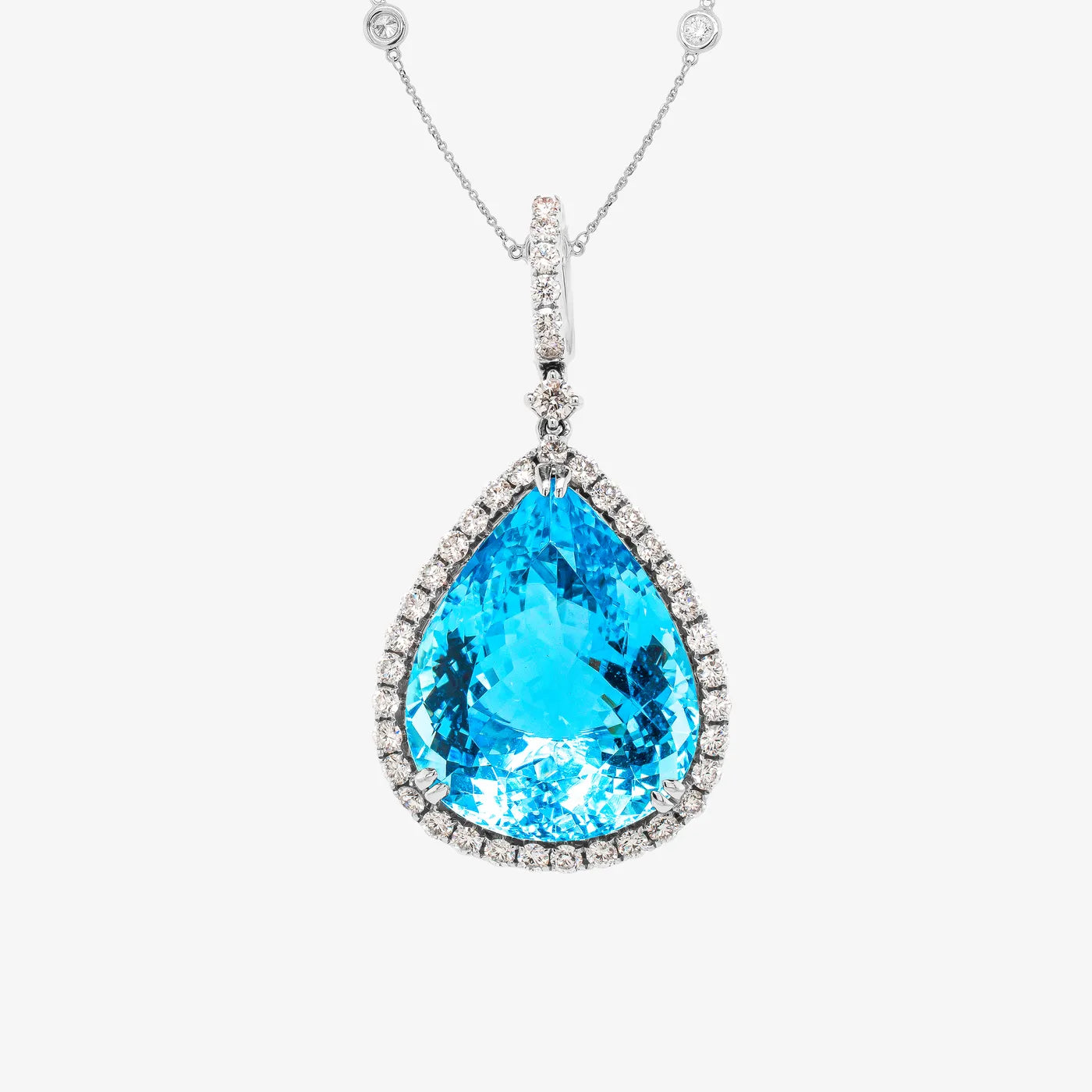 Aquamarine gemstone pendant on a diamond chain