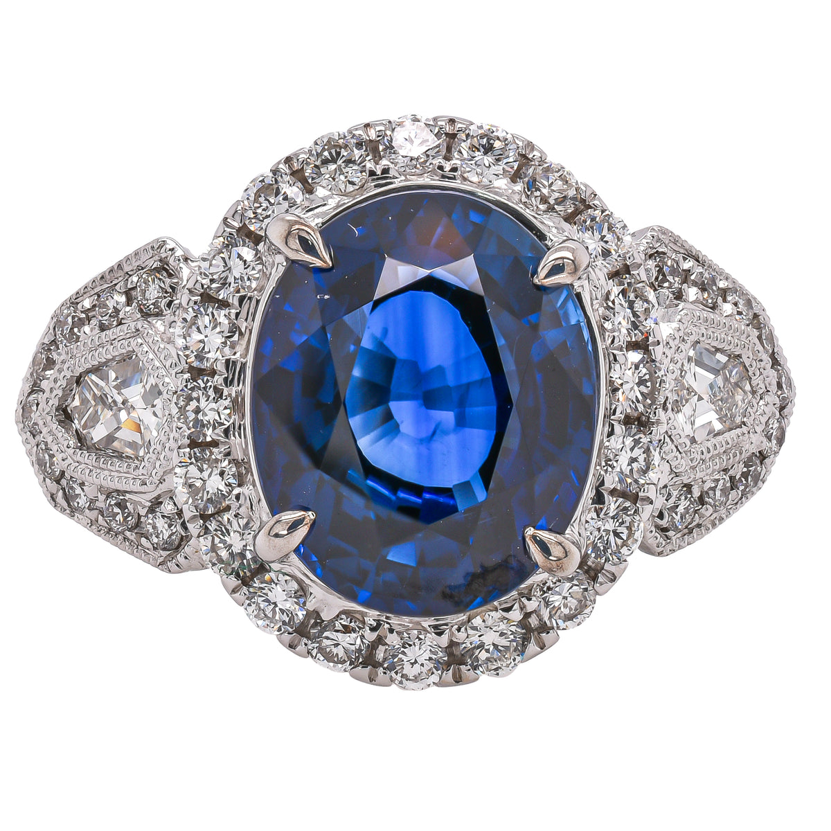 18K White Gold Oval Sapphire & Diamond Halo Ring | 4.06 CT Sapphire & 1.03 CTW Diamonds