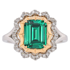 Platinum and 14K Yellow Gold Emerald and Diamond Halo Flower Ring, view 1