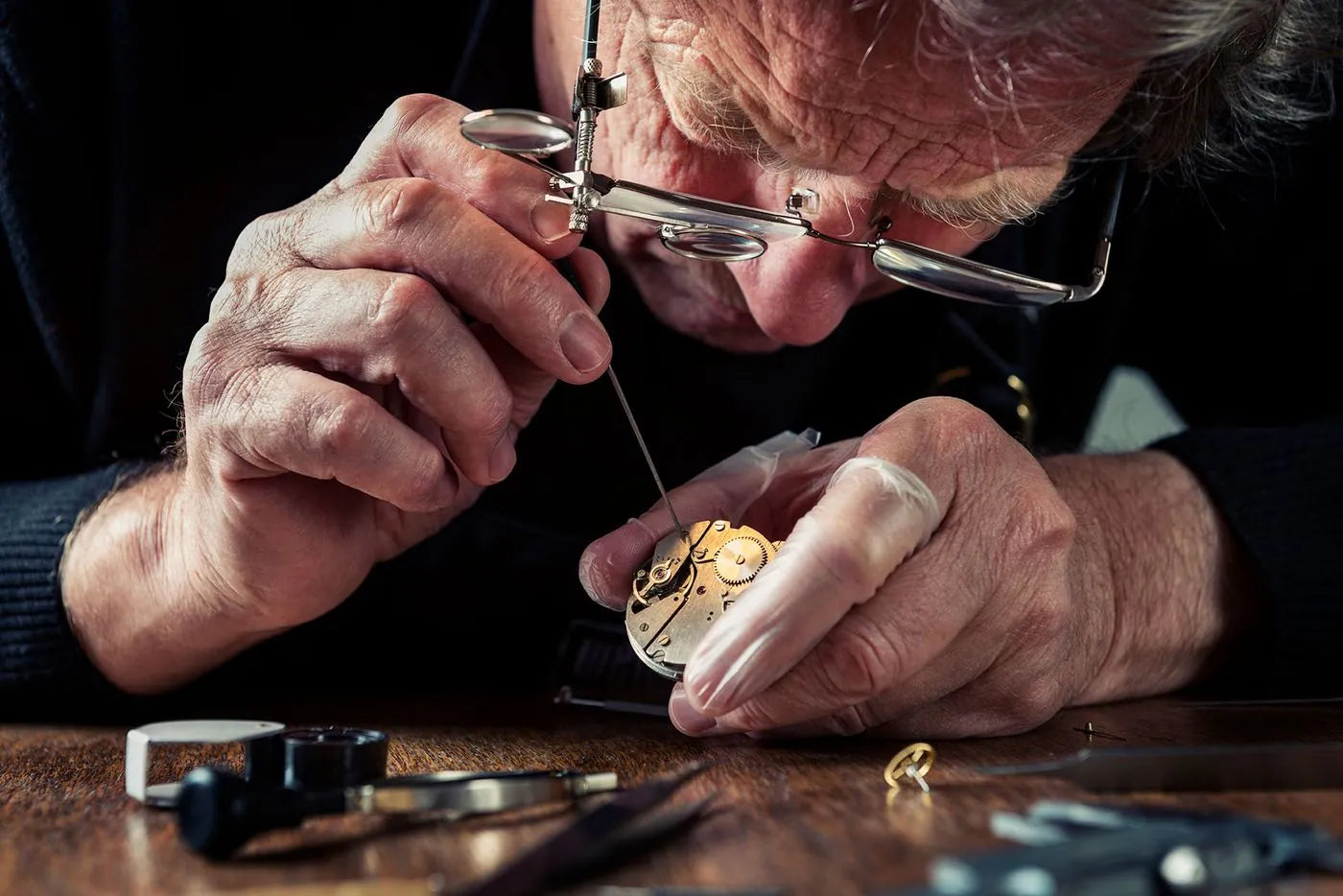 LeeBrant's in-house watchmaker servicing a fine swiss watch