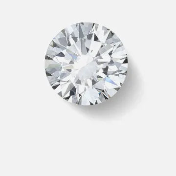 A loose round brilliant cut diamond photographed against a white background