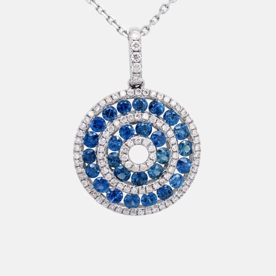 Sapphire and diamond circle pendant on a white gold chain