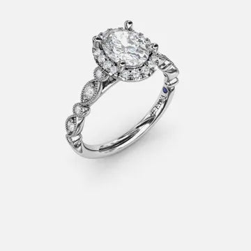 Oval diamond halo engagement ring with a milgrain detailed white gold band